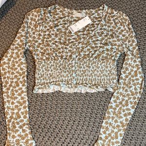 Brand New. Long Sleeve Crop Top. Size Medium.